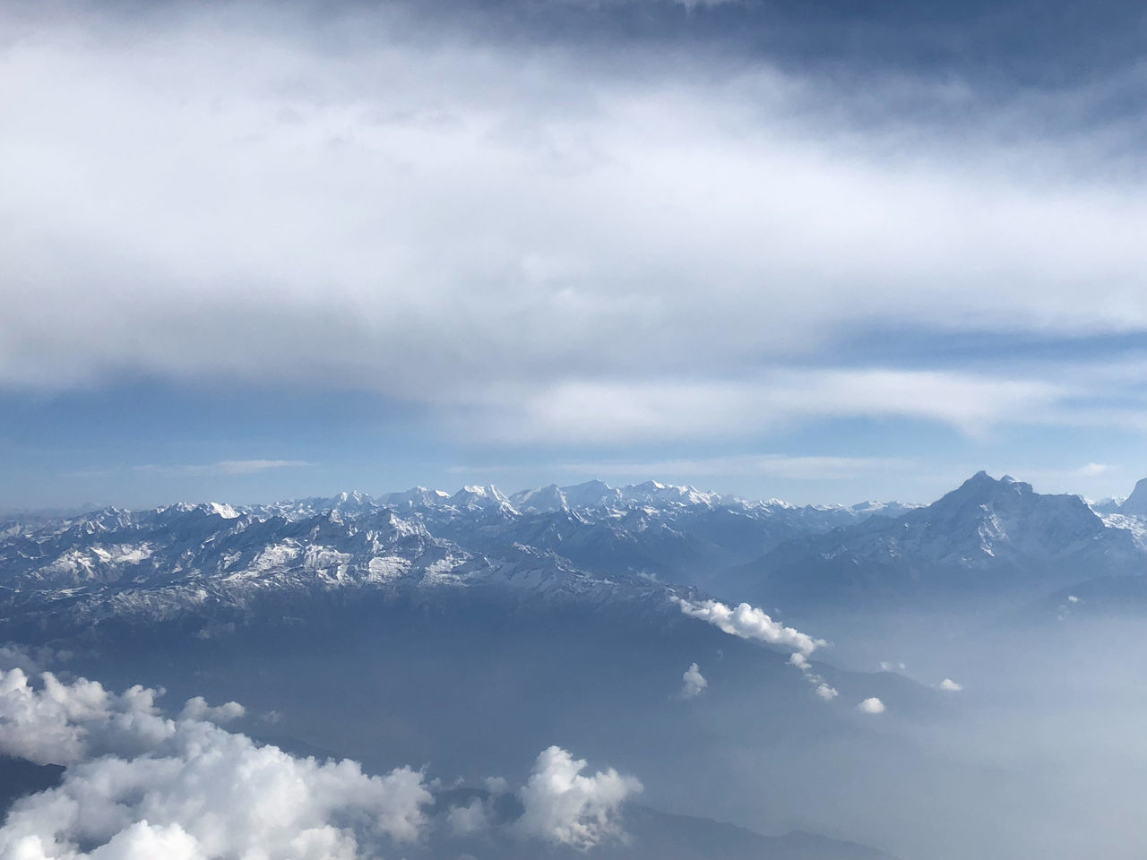 cloud - sky, mountain, sky, beauty in nature, scenics - nature, tranquility, tranquil scene, snow, cold temperature, mountain range, no people, winter, environment, nature, day, non-urban scene, landscape, snowcapped mountain, idyllic, outdoors, mountain peak