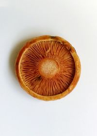 High angle view of lemon slice against white background