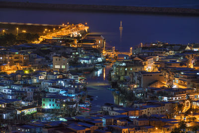 High angle view of illuminated city at night