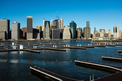 Empty pier and a view of manhattan from brooklyn.