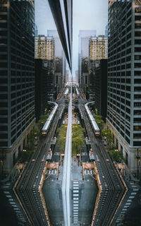 High angle view of street amidst buildings in city