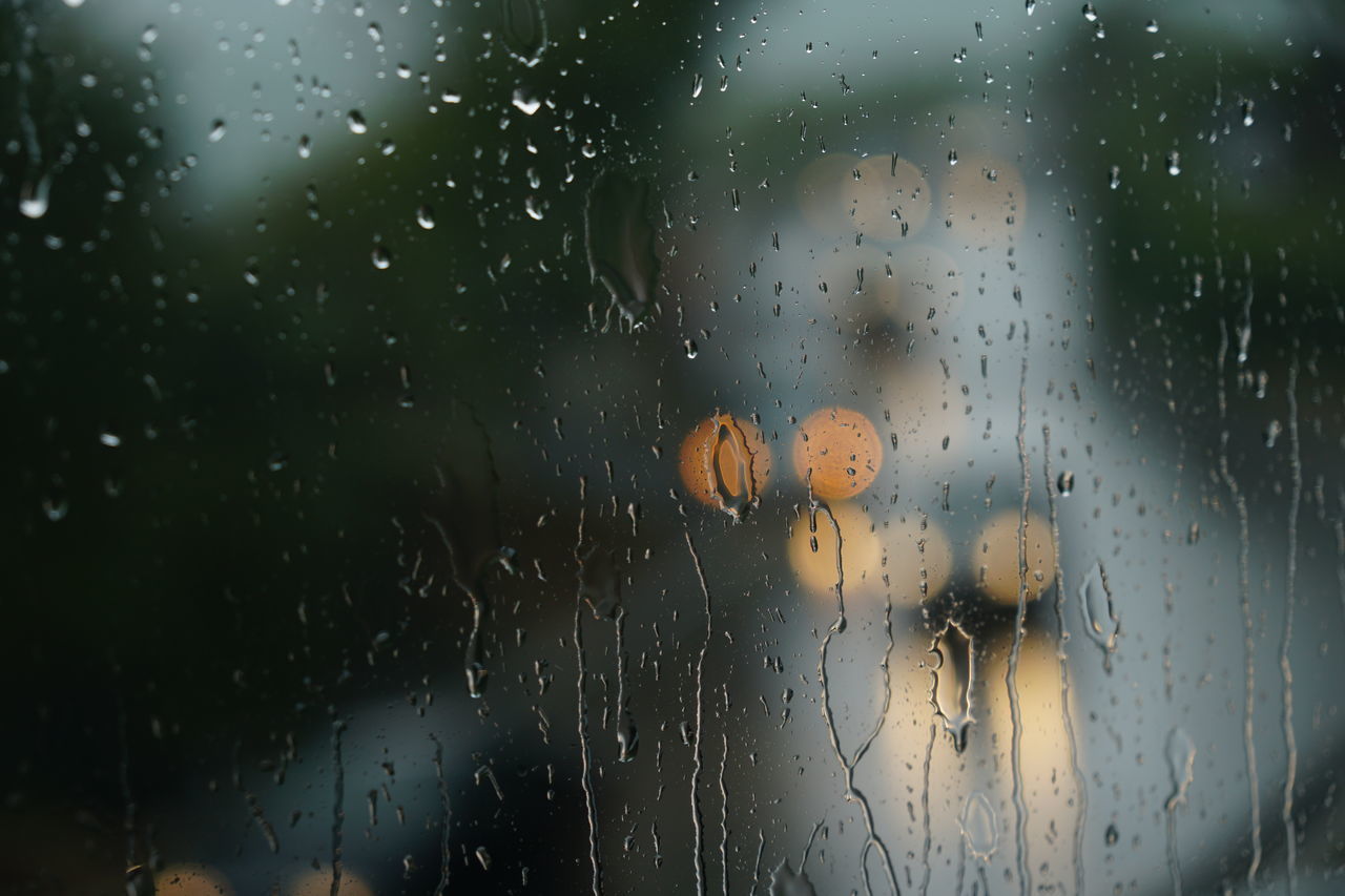 FULL FRAME SHOT OF WET GLASS WINDOW