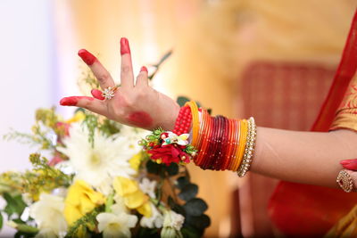 Cropped hand of bride gesturing in wedding ceremony