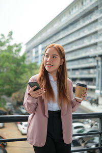 Young woman using mobile phone