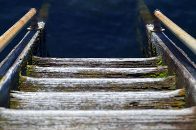 Wooden steps leading towards river