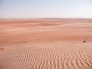 Scenic view of desert against clear sky