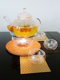 View of chrysanthemum tea in glass teapot