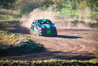 View of car on dirt road