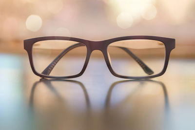 Close-up of eyeglasses on table