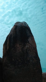 Close-up of rock formation in sea