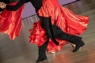 Low section of woman standing on stage