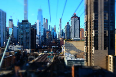 Modern buildings in city against sky