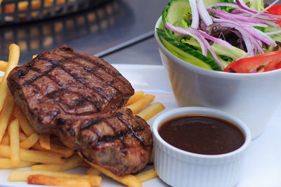 Close-up of food in plate on table