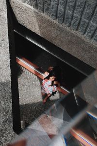 High angle view of man walking on floor