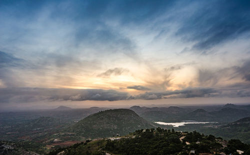 Scenic view of landscape against sky during sunset