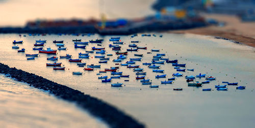 Tilt-shift image of boats on seat