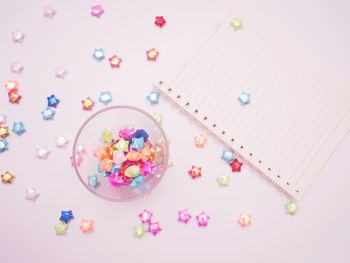 High angle view of multi colored candies on table