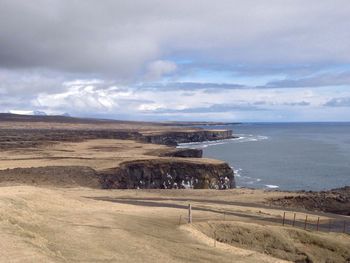 Scenic view of beach against sky