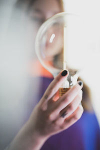 Close-up of woman hand holding cigarette