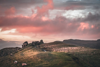 Scenic view of landscape against sky during sunset