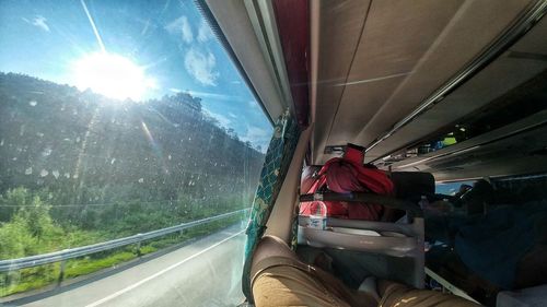 Man sitting in glass window