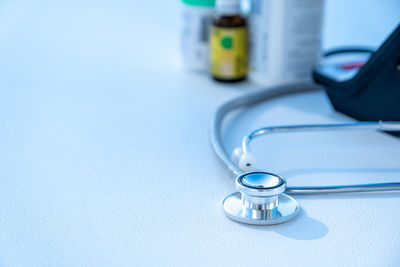 High angle view of drinking glasses on table