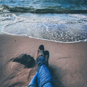 Low section of man on beach