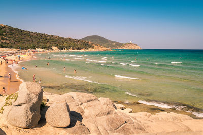 Scenic view of beach against clear sky