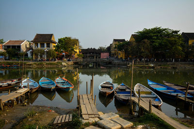 Boats moored at marina