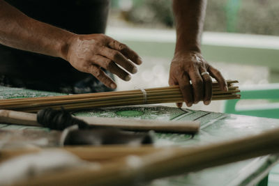 Man working on wood