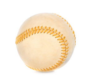 Close-up of baseball against white background