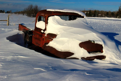 Scenic view of snow covered landscape