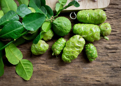 High angle view of green leaves on table