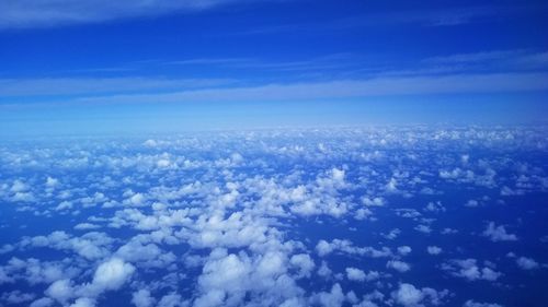 Aerial view of cloudscape against blue sky