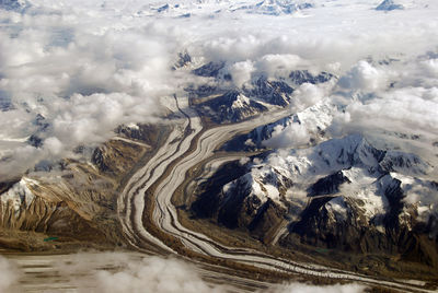 The chugach mountains in alaska with summer snow and clouds