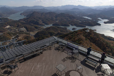 High angle view of mountain range with rooftop 