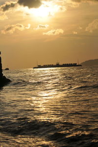 View of calm sea at sunset