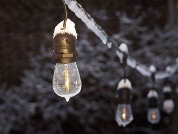 Close-up of illuminated light bulb