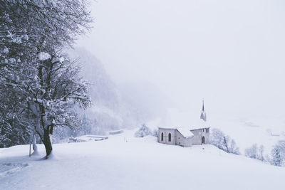 Scenic view of snow covered landscape