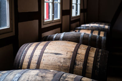 Whisky aging in wooden barrels near windows in the black forest