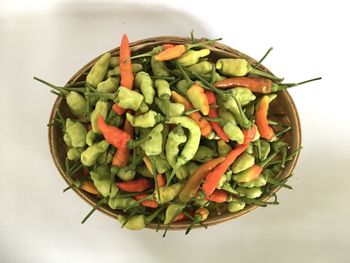 High angle view of chopped vegetables against white background