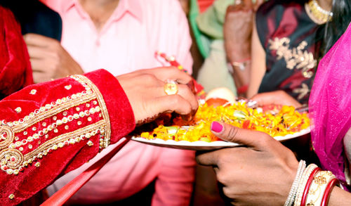 Midsection of woman in traditional clothing