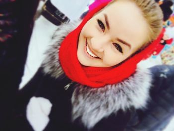 Portrait of young woman in snow