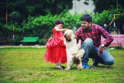 Friends with dog on land