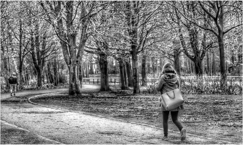 Girl standing on field in park