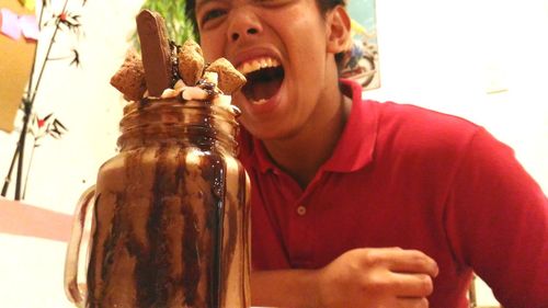 Young man eating food