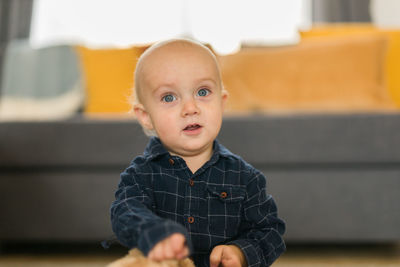 Portrait of cute boy looking away