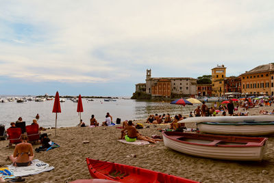 Sestri levante, italy -  bathers in the beautiful bay of silence, symbol of the city