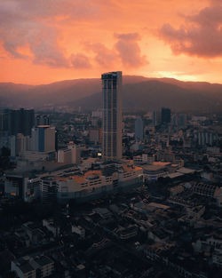 High angle view of buildings against sky during sunset
