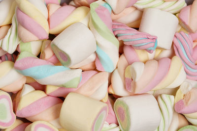 Multi-colored marshmallows. background or texture of colorful blue and pink marshmallows.